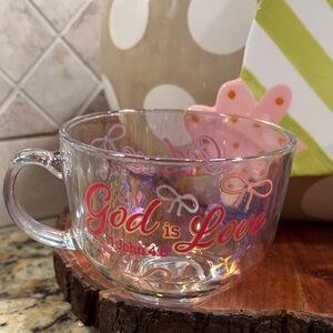 Clear Irredescent Glass Mug with 'God is Love' Design.